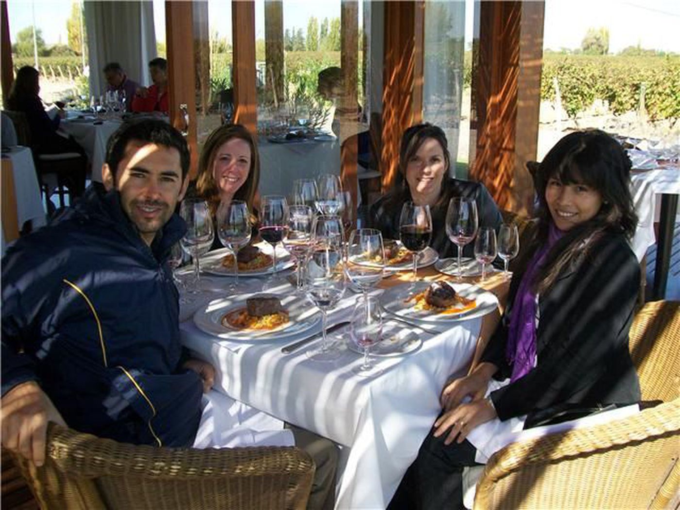 People enjoying a meal and wine in Mendoza