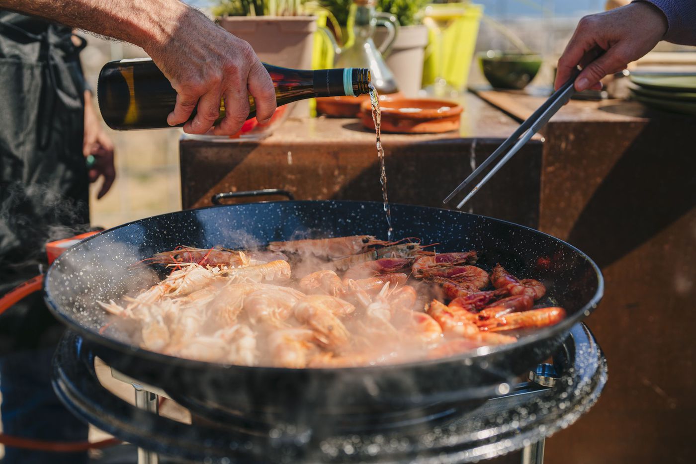 A photo of Paella Cooking with a chef, winery tour & sunset sailing to Barcelona